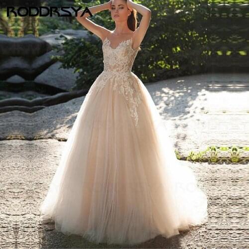 Sleeveless Champagne Wedding Dresses 2021 Lace Appliques Tulle A-line Bridal Gown Back Illusion Beach Princess Marriage Gowns