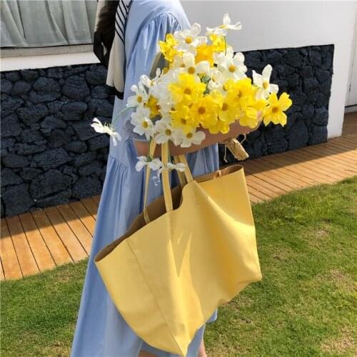 Large capacity bag female 2021 new cream yellow tote bag all-match soft leather retro shoulder bag shopping bag