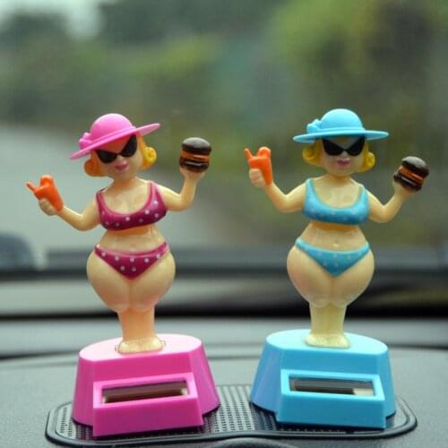 High-quality ornaments for car interiors Car bikini beauty ornaments Solar automatic swing cartoon couple gifts