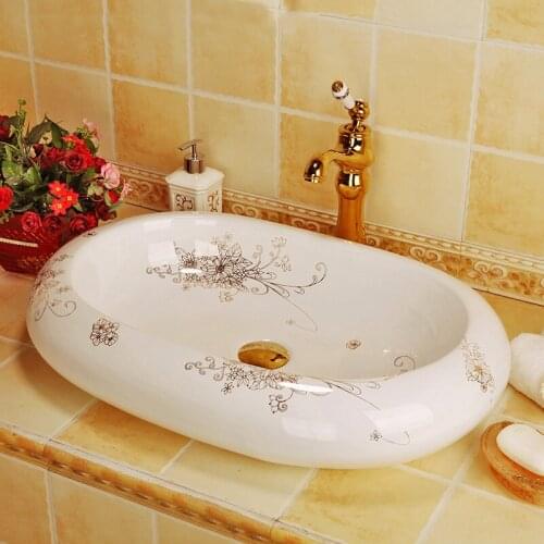 China Artistic Handmade porcelain Round bathroom counter top ceramic Bathroom sink decorative wash basin oval white color