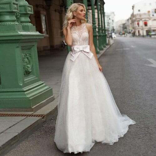Polka-Dot Tulle Wedding Dresses 2021 A-Line O-Neck Lace Sequins Button Sleeveless Princess Bridal Gown With Bow Sweep Train
