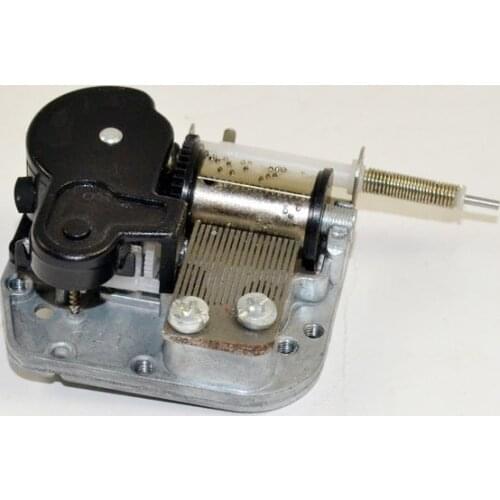 DIY music box mechanism with flexible rotating shaft & stop function