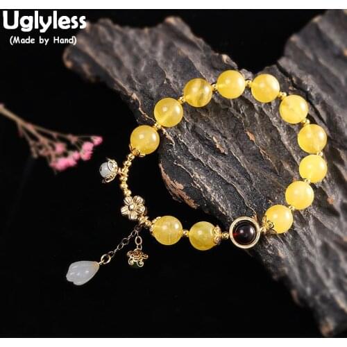 Uglyless Luxury Natural Amber Beeswax Yellow Gemstones Bracelets for Women Beading Elastic Rope 925 Silver Floral Bracelet Jade