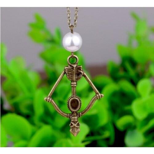 N319 European and American film Neighboring Necklace Arms Bows and Dangling The Hunger Games Sweater Chains