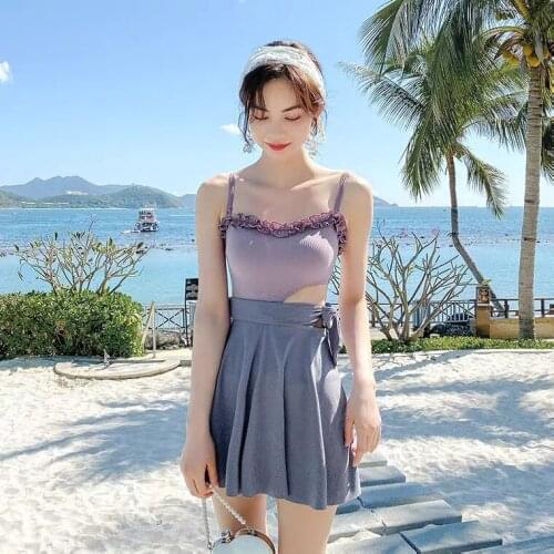 Swimsuit girl in one 2021 new hot spring conservative cover meat student suspender fairy fan Xiaoxiong gather swimsuit