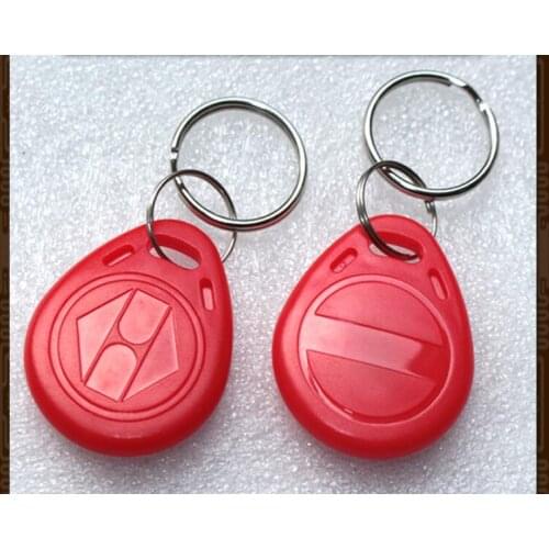 Free shipping 100pcs 125KHZ T5577 keychain T5577 card ID blank card ID readable and writeable card T5557 Key fobs T5577 token