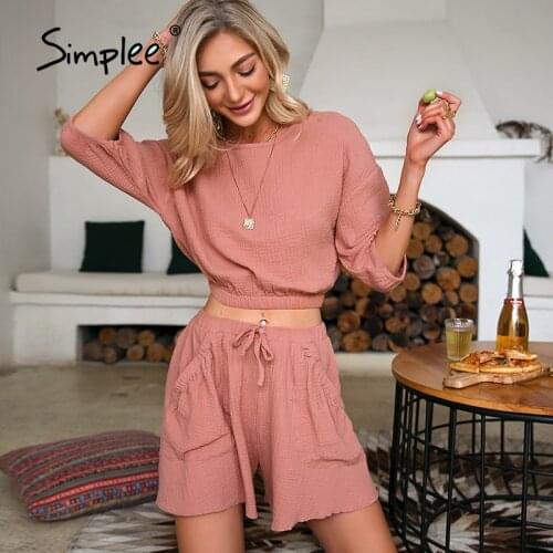 Simplee Pockets elastic waist lace up woman suits Round neck button decoration summer sets Pure color loose slim suit