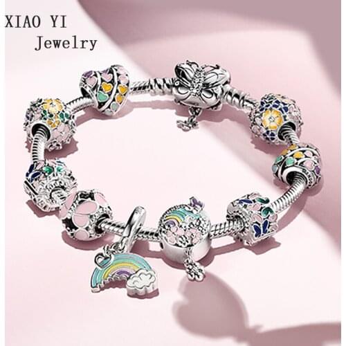 XIAOYI jewelry 100% S925 11 charm Garden series butterfly surround profusion of flowers fashionable ornament bracelet
