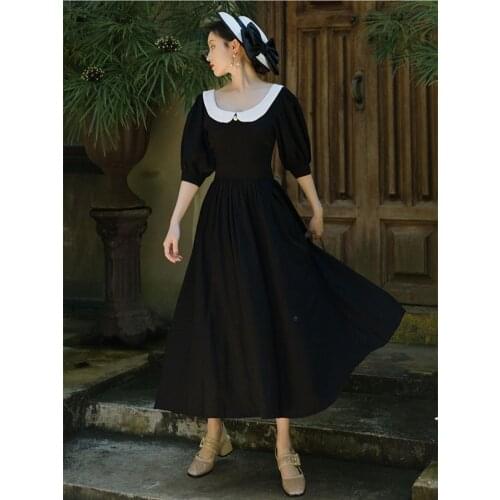 Hepburn Style Temperament Black Dress Women 2021 French Retro Girl Lapel Backless Sexy Fashion Chic Button Mid-length Dresses