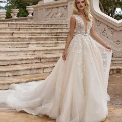 O Neck A-line Wedding Dresses Sexy Backless Lace Appliques Bridal Gown Sleeveless Robe De Mariage Wedding Gown Vestido De Noiva