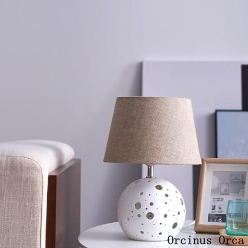 Nordic modern simple hollow ceramic table lamp living room bedside lamp creative romantic LED table lamp free shipping