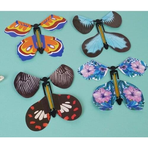 10 Pcs Flying in the Book Fairy Rubber Band Powered Wind Up Butterfly Toy Gifts 77HD