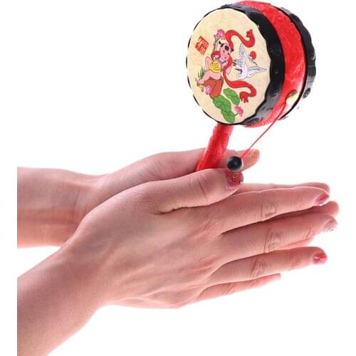 1Pc Chinese traditional spin toy rattle drum kids cartoon hand bell for baby