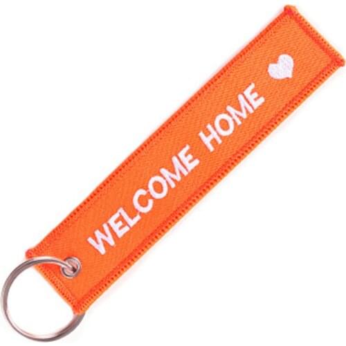 Orange bottom white embroidered hot style car key chain backpack pendant couple