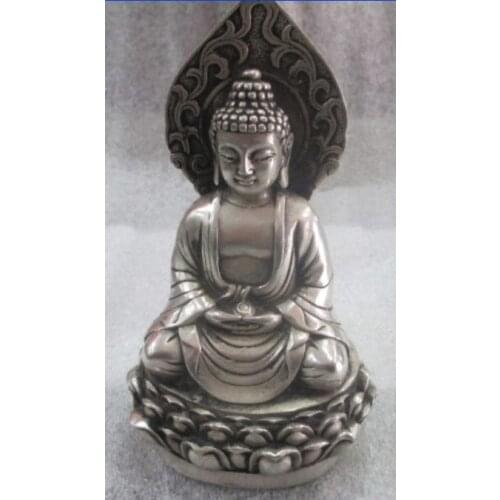 The ancient Chinese sculpture Buddha had silver plated brass.The Buddha