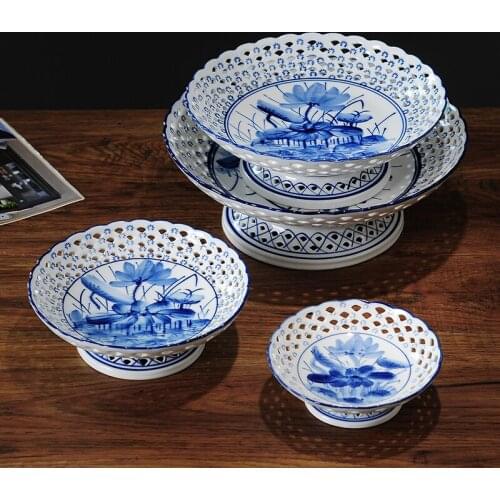 New Chinese style plate blue and white porcelain high foot ceramic fruit plate creative hollow out retro living room Chinese