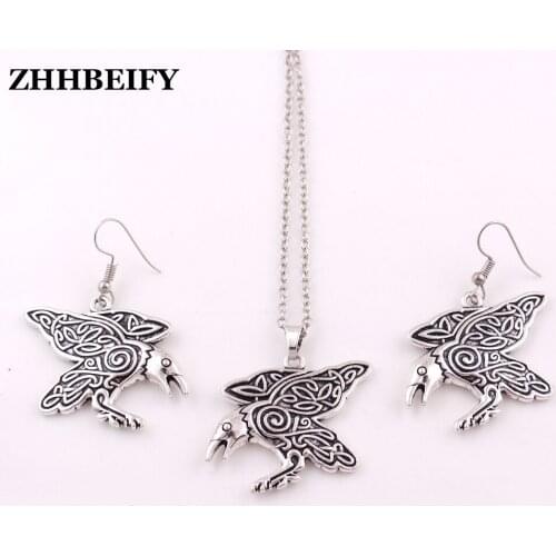 Raven Pendant Morrigan Crow Jewelry with CT Spirals charm Leather chain Pendant wheat bracelet Necklace