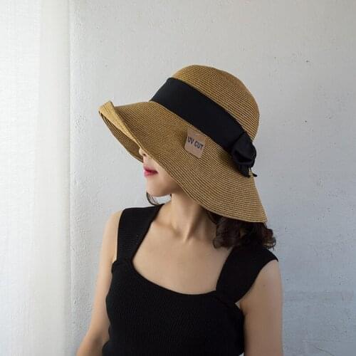 Spring and Summer New Style Raffia Grass Back Bow Straw Hat Women Foldable Beach Sun Hat Large Eaves Sunscreen Bucket Hat UV cut