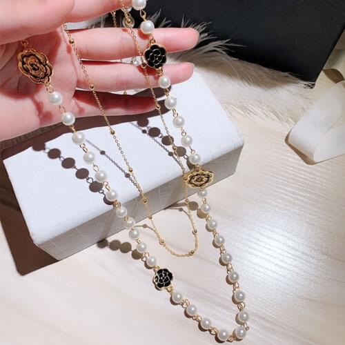 Luxury Hollow Camellia Pearl Pendant Flower sweater chain necklace for women