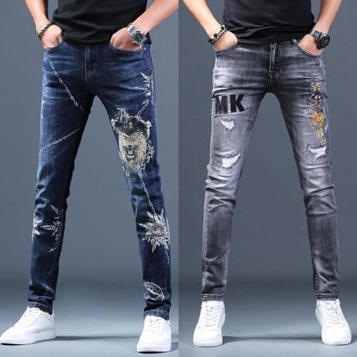 Mens ripped embroidered jeans spring& summer slimming Korea version casual thin denim long pants