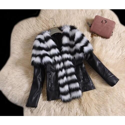 Autumn winter Europe and the United States new imitation raccoon hair sheep skin anti - season special sale imitation fur coat