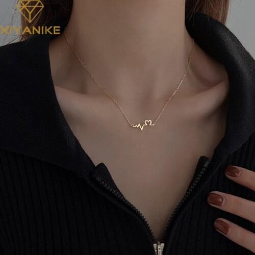 XIYANIKE 925 Sterling Silver Hollow Love Heart Beating Zircon Pendant Necklace Female Fashion Cute Beautiful Temperament Wedding