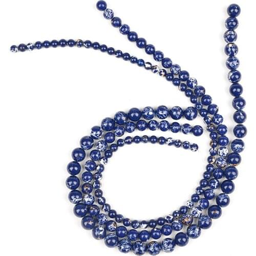 Synthesis stone String of Loose beads The pendant With a deep blue Mystery and The dark purple bead having a