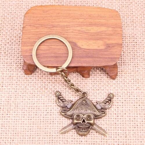 20pcs New Fashion Keychain 45x34mm pirate skull and cross swords Pendants DIY Men Jewelry Car Key Chain Souvenir For Gift