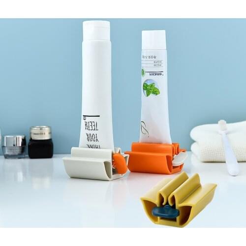 New Toothpaste Dispenser Tube Squeezer Tooth Paste Squeezer Facial Cleanser Press Rolling Holder Bathroom Accessories for Kids