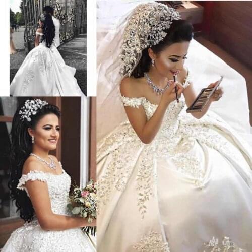 2020 luxury Arabic Ball Gown Wedding Dresses Satin Off Shoulder Illusion Lace Applique Crystal Beaded Plus Size Bridal Gowns
