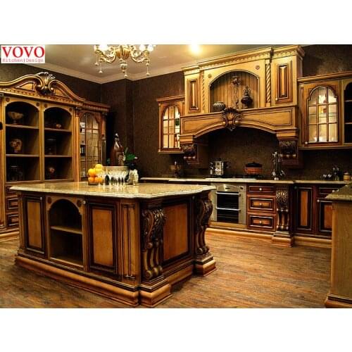 Vintage kitchen cabinets with gold-painted design