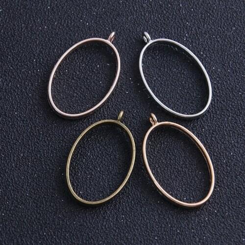 6pcs 24*39mm Four Color Alloy Jewelry Accessories Ellipse Charm Hollow Glue Blank Pendant Tray Bezel
