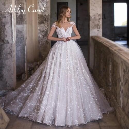 Ashley Carol A-Line Wedding Dress 2021 Delicate Beaded Scoop Lace Appliques Bride Princess Backless Chapel Train Bridal Gown
