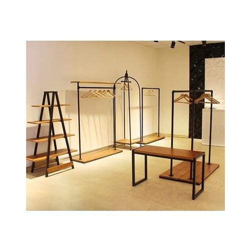 Vintage solid wood womens clothing store hanger display rack floor type childrens clothing store shelf hanging on the wall