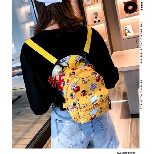 2020 New Single-shoulder dual-purpose female cartoon canvas backpack primary school Polyester Waterproof and wear-resistant bag