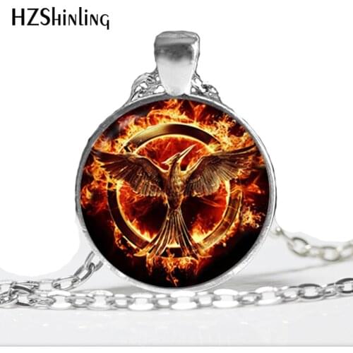 HZ--A111 fly huger games Bird with arrow Pendant fashion fire phoenix pendant dome jewelry cabochons round 25mm HZ1