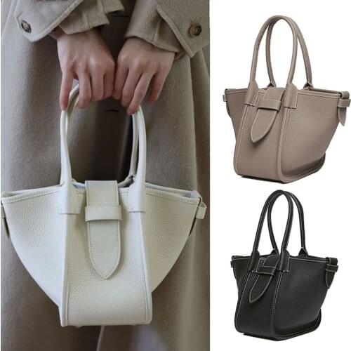 Retro leather female portable niche cowhide swing bag bucket bag basket tote bag in Europe and America