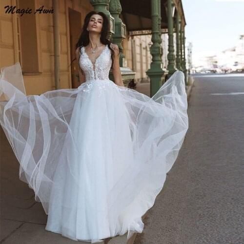 Magic Awn Graceful White Beach Wedding Dresses 2021 Lace Appliques V-Neck Boho A-Line Bride Dress Open Back Vestidos De Fiesta