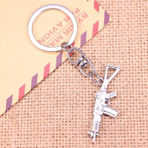 Fashion Keychain 45x13mm machine gun assault rifle Pendants DIY Men Jewelry Car Key Chain Ring Holder Souvenir For Gift