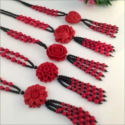 The New Korean version of the Red Red Bohemian national style sweater chain long rose flower sunflower heart-shaped necklace lad