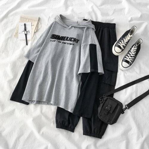 Fashion two-piece suit female 2020 autumn new Korean version of the mosaic hooded sweater high waist overalls suit