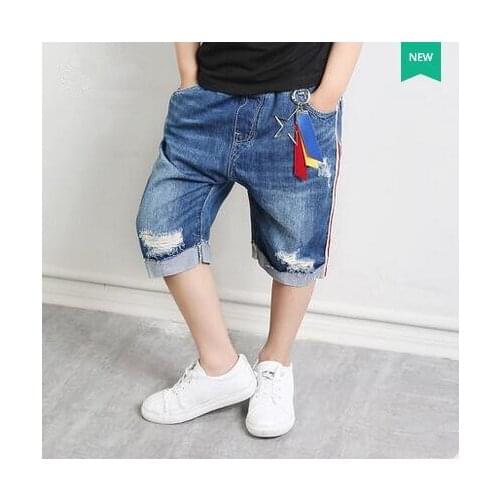 Kids 2017 New 2-11T Boys Girl Blue Ripped Jeans Boys Trousers Baby Girls Pants Casual Classic Children Fashion Hole Denim Jeans