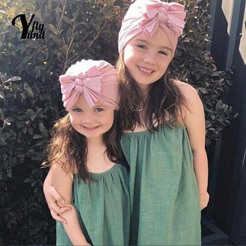 Yundfly 19*17 CM Toddler Solid Color Knitting Hats Fashion Handmade Bowknot Baby Caps Children Headwear Holiday Gift Photo Props