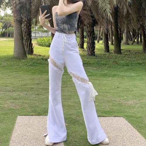 China to create a new personalized fashion lace lace hollow strap splicing split denim bell bottoms spot