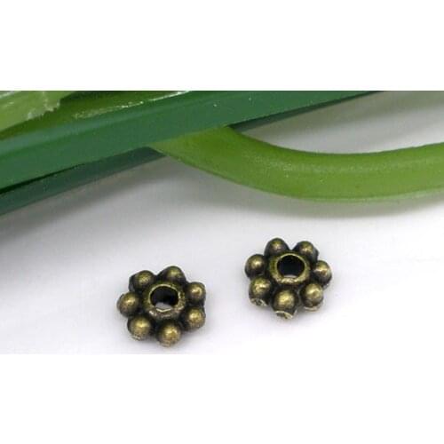 DoreenBeads Retail 1000 PCs Bronze Tone Tiny Daisy Spacers Beads 4MM Findings