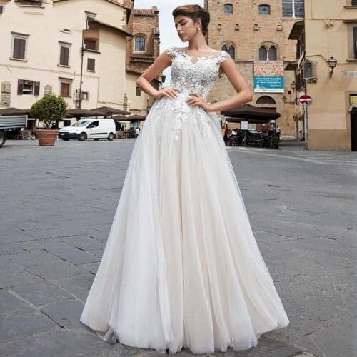 Champagne Bohemian Wedding Dresses Lace Appliques Cap Sleeves Illusion Scoop Cap Sleeves A Line Bride Gowns свадебное платье