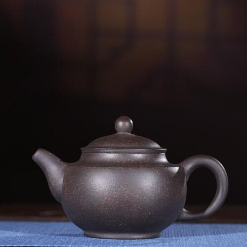 Yixing recommended authentic handmade undressed ore black kung fu zhu mud black gold just Duo pot teapot tea gifts