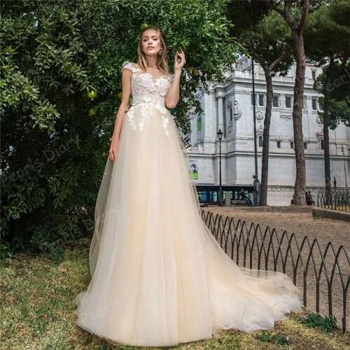 Charming Champagne Beach Wedding Dresses 2021 Robe De Mariee Ivory 3D Flower A Line Applique Bride Gown Customized Bridal Dress