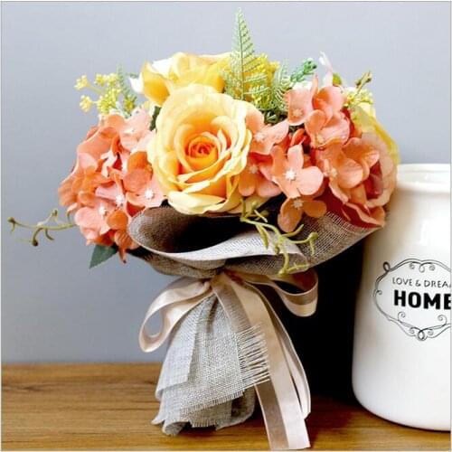 A bouquet vintage Orange flowers wedding bridal bouquet bride holding flower artificial flower bride bouquet for wedding party