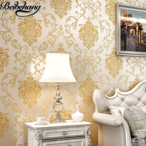 Beibehang European non-woven wallpaper wall living room TV backdrop embossed three-dimensional sprinkle gold wallpaper Damascus